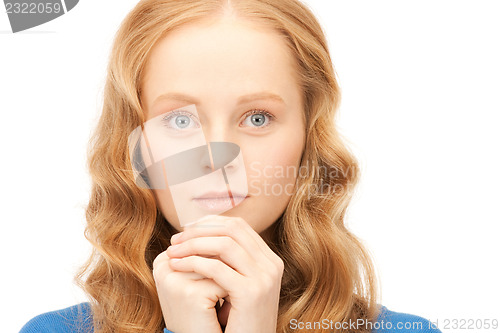 Image of praying businesswoman