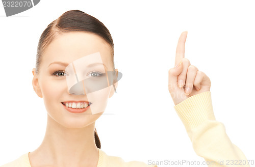 Image of  woman with her finger up	 