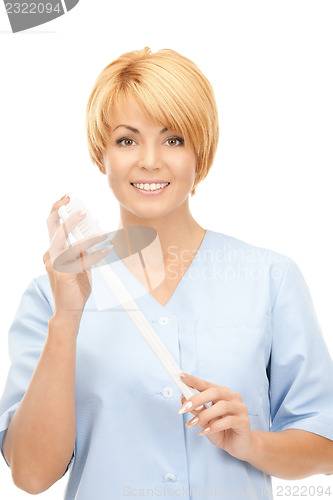 Image of doctor with toothbrush