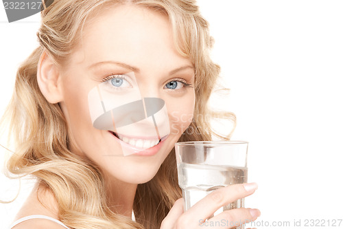 Image of beautiful woman with glass of water