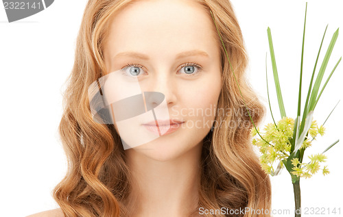 Image of woman with green sprout