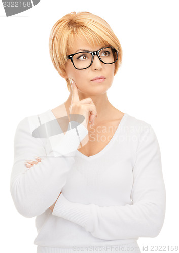 Image of pensive businesswoman over white
