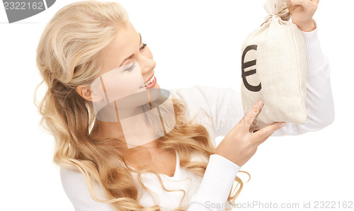 Image of woman with euro signed bag