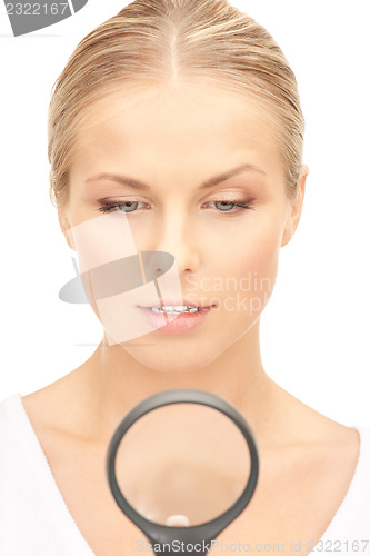 Image of woman with magnifying glass