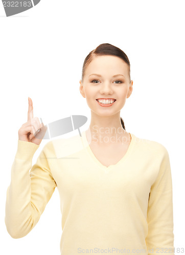 Image of  woman with her finger up	 