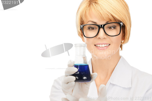 Image of lab worker holding up test tube