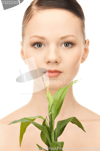 Image of woman with sprout