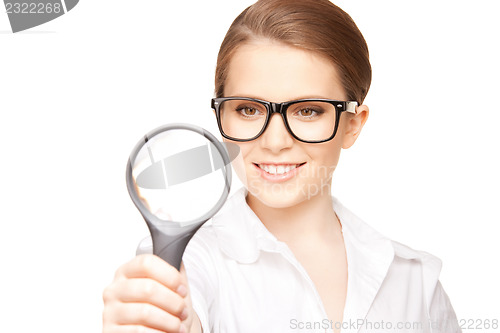 Image of woman with magnifying glass