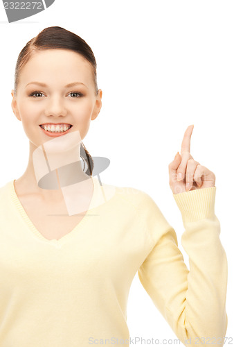 Image of  woman with her finger up	 