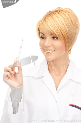 Image of attractive female doctor with thermometer