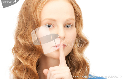 Image of finger on lips