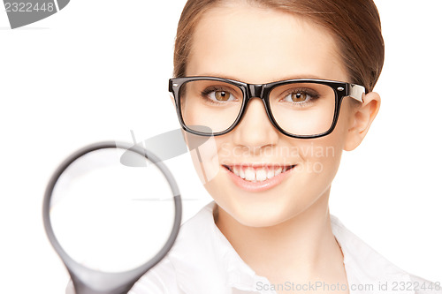 Image of woman with magnifying glass