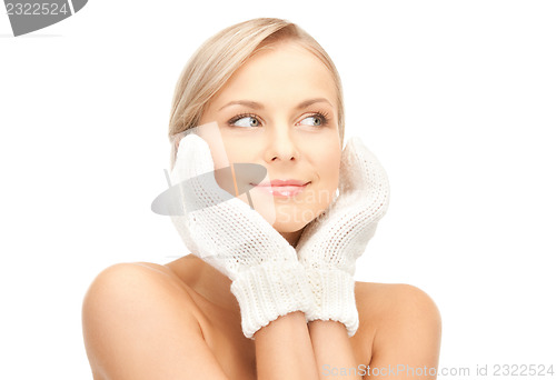 Image of beautiful woman in mittens