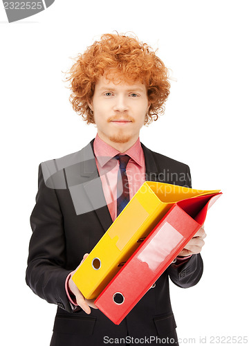 Image of man with folders