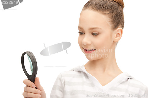 Image of teenage girl with magnifying glass