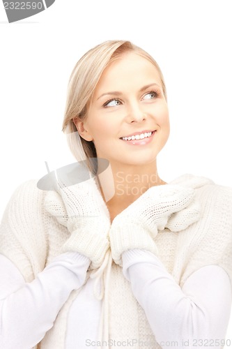 Image of beautiful woman in white sweater