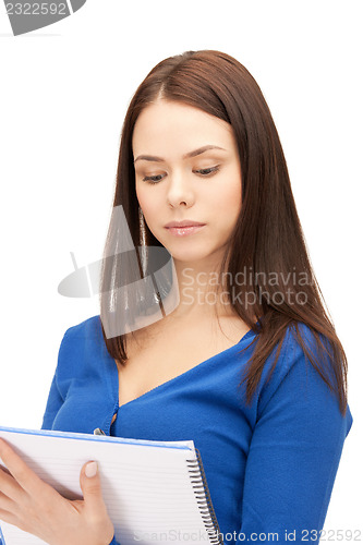 Image of calm woman with big notepad