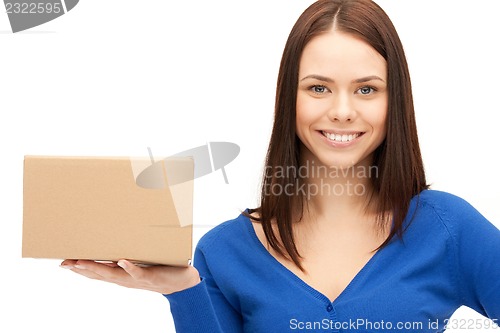 Image of attractive businesswoman with cardboard box