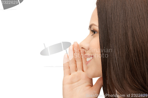 Image of woman whispering gossip