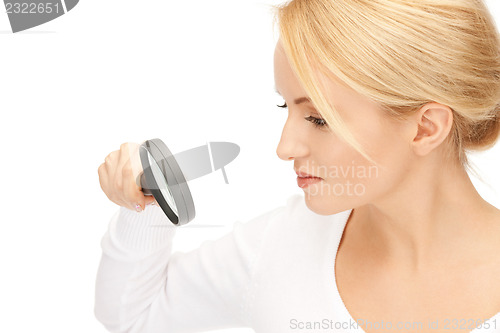 Image of woman with magnifying glass