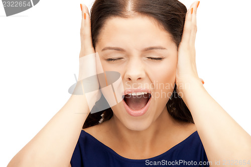 Image of woman with hands on ears