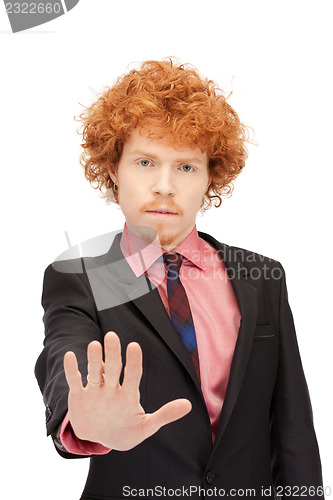 Image of man making stop gesture