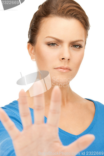 Image of woman making stop gesture