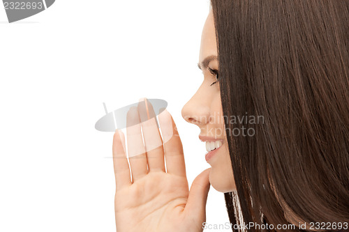 Image of woman whispering gossip