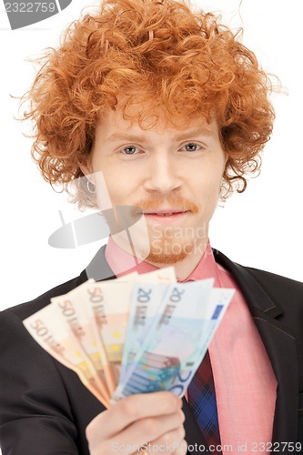 Image of handsome man with euro cash money