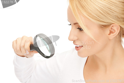 Image of woman with magnifying glass