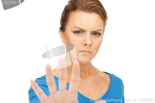 Image of woman making stop gesture