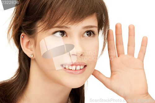 Image of teenage girl listening gossip