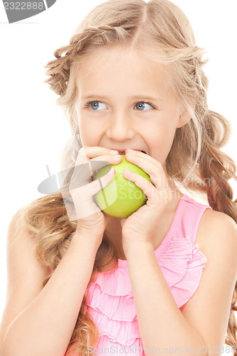 Image of little girl with green apple