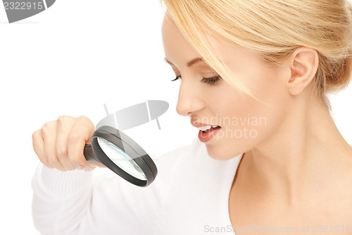 Image of woman with magnifying glass