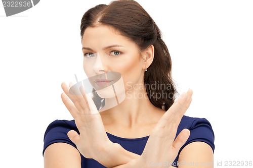 Image of woman making stop gesture