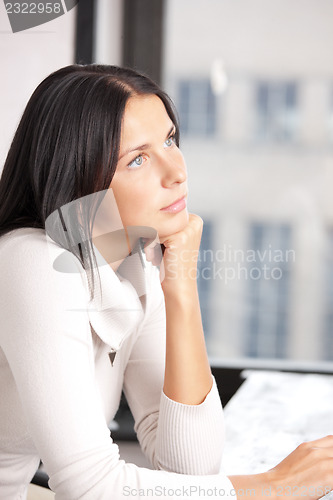 Image of calm and serious woman