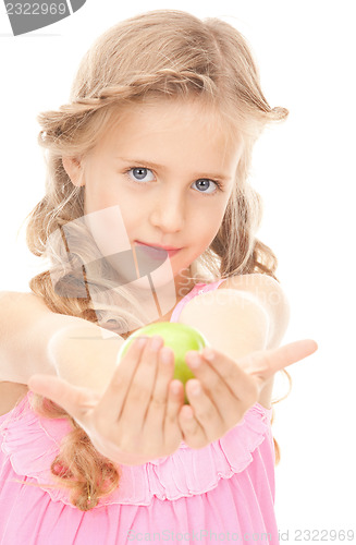 Image of little girl with green apple