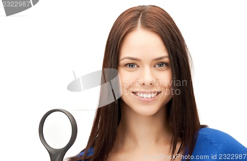 Image of woman with magnifying glass