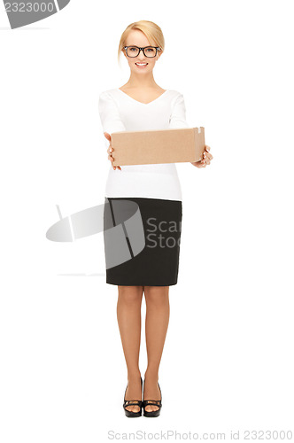 Image of attractive businesswoman with cardboard box
