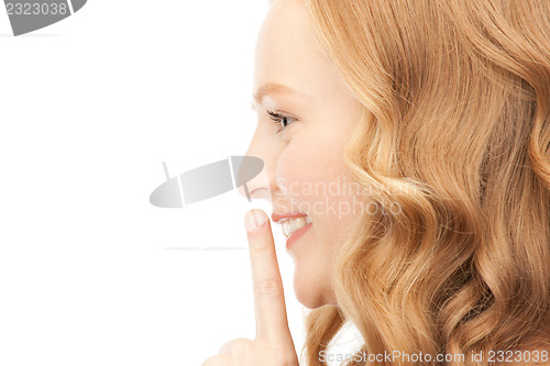 Image of finger on lips