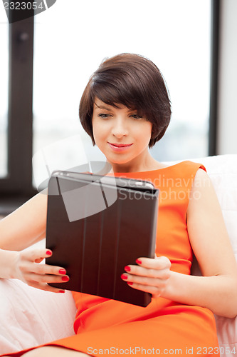 Image of happy woman with tablet pc computer