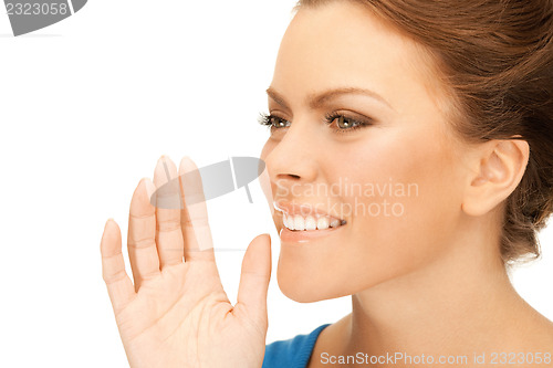 Image of woman whispering gossip