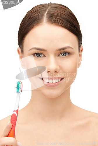 Image of beautiful woman with toothbrush