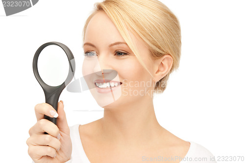 Image of woman with magnifying glass