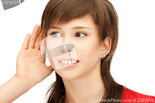 Image of teenage girl listening gossip