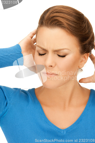 Image of woman with hands on ears