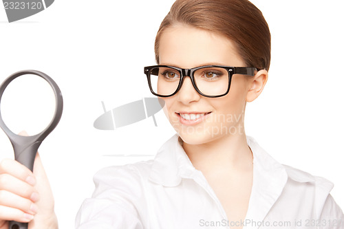 Image of woman with magnifying glass