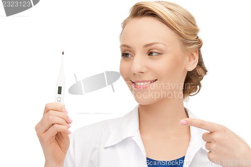 Image of attractive female doctor with thermometer