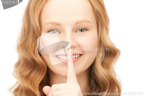 Image of finger on lips