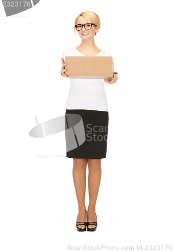 Image of attractive businesswoman with cardboard box